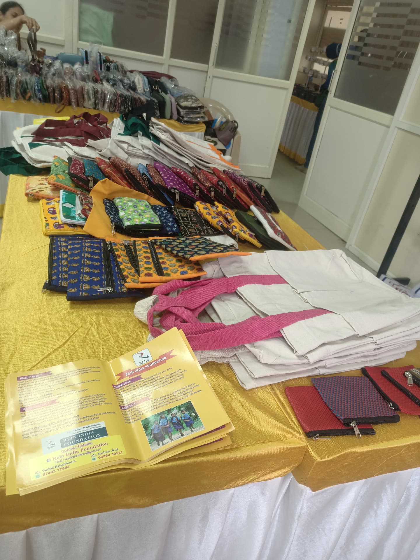 Deepavali Mela stall with pouches, tote bags and accessories