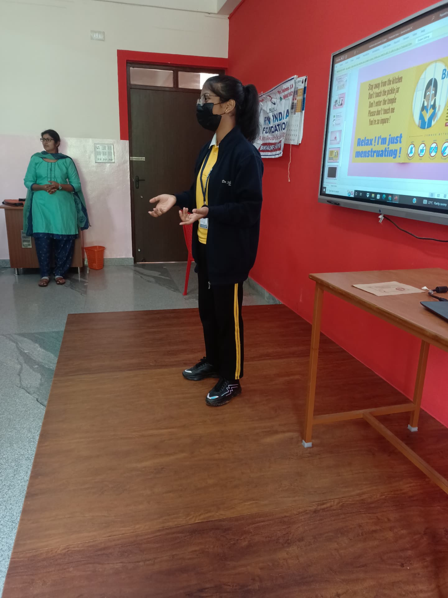 Facilitator discussing menstrual wellbeing during a REIN India school workshop