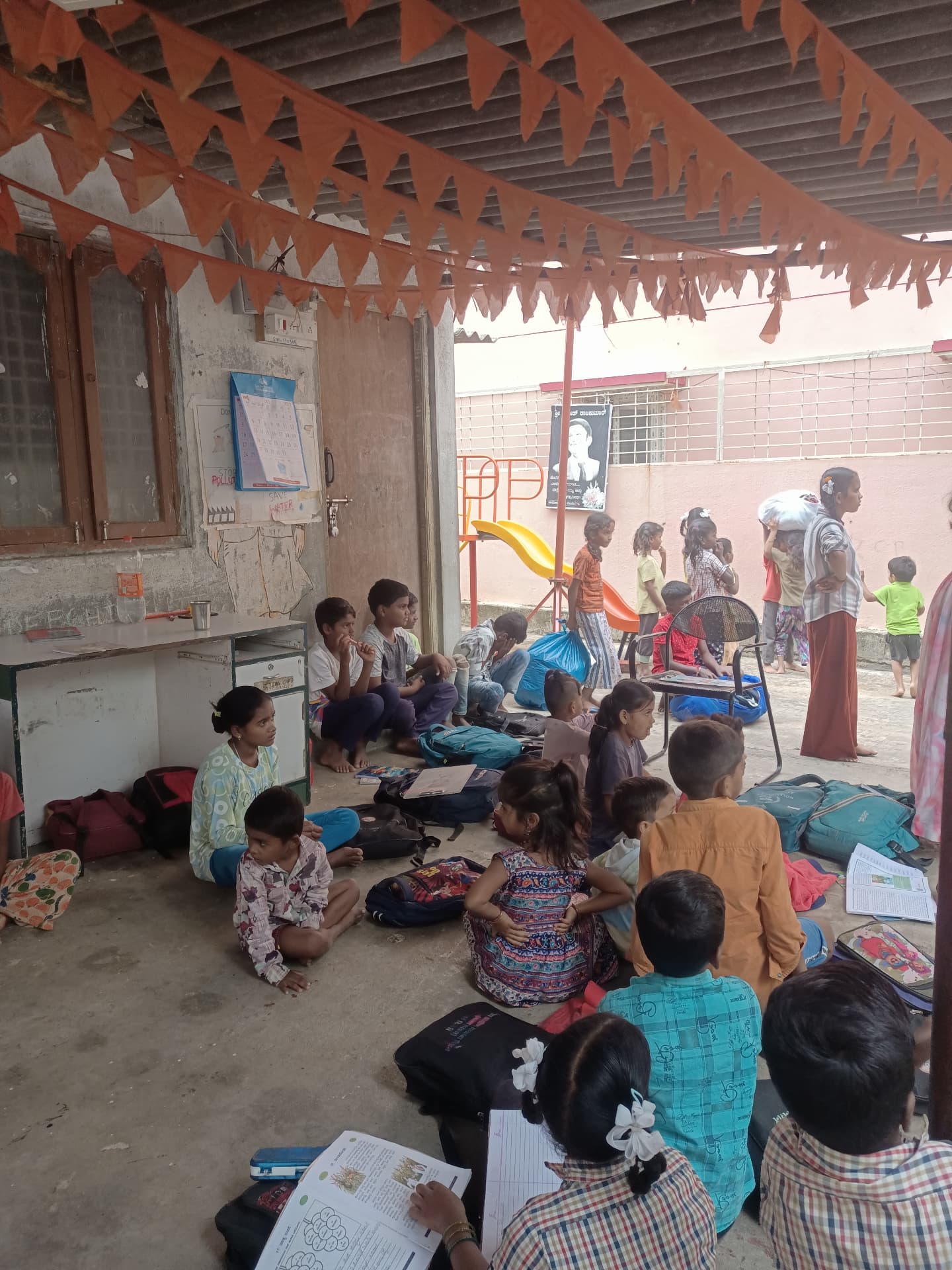 Children studying together at the community learning space