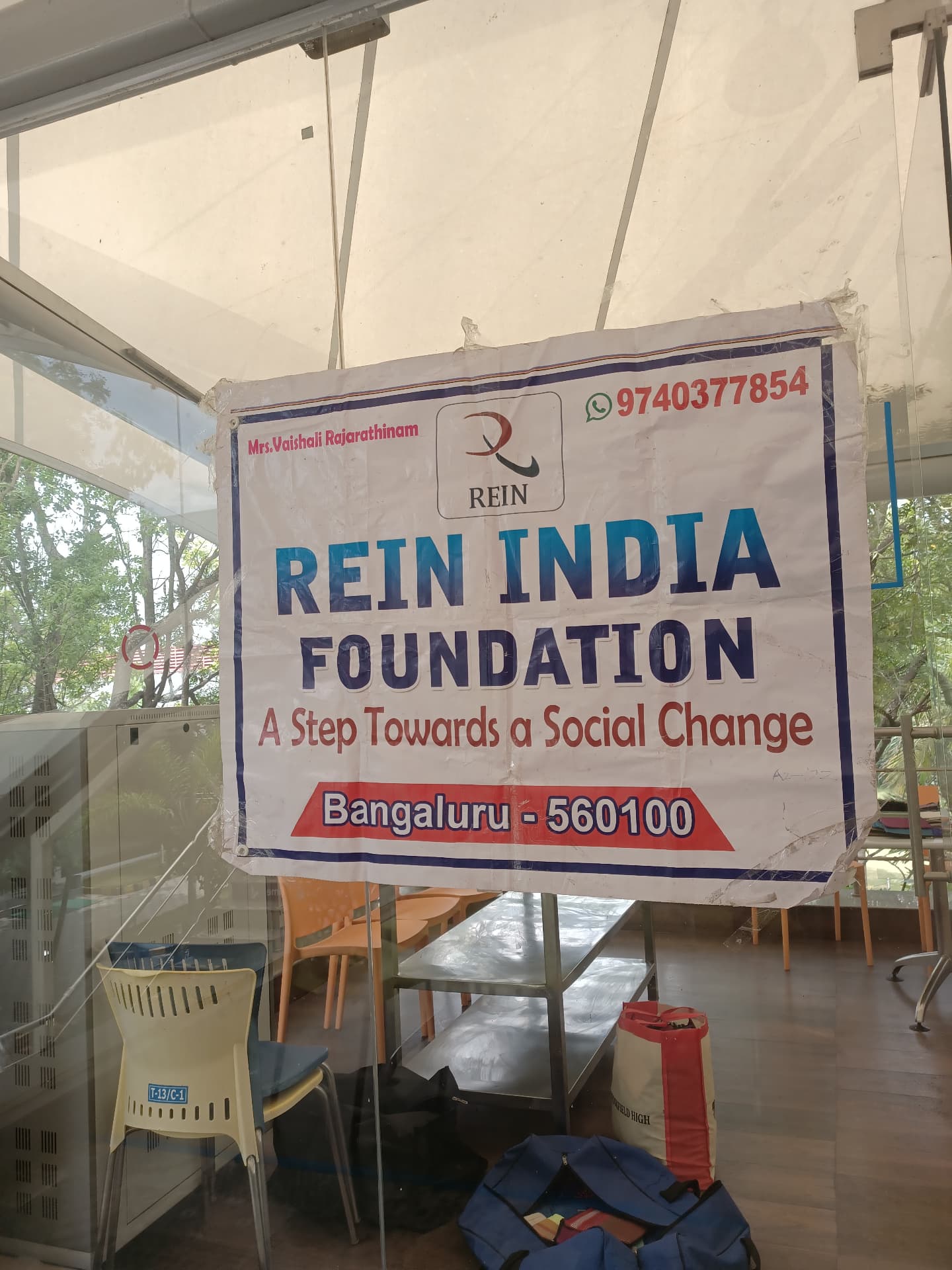REIN India Foundation banner at a Wings of Desire exhibition