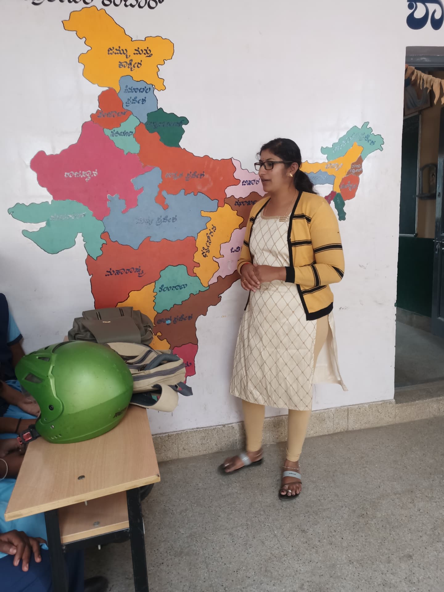 REIN India facilitator speaking during a school health awareness programme